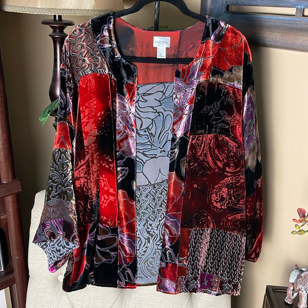 Chico’s velvet dressy jacket in rich tones of black, reds and purples.
